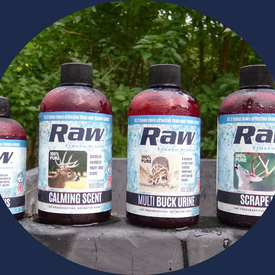 Bottles of RAW Frozen Scents lined up outdoors